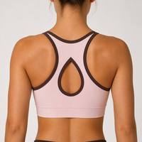 Soutien-gorge de sport court pour femme, tendance et de haute qualité, avec décolleté en V, découpe au dos en forme de larme et bordure contrastante, idéal pour le yoga, le pilates, les activités décontractées, les sorties en extérieur, la gym et la course à pied.