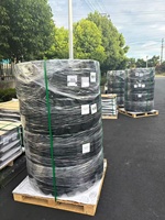 Reifen für Baggerlader: Pannensichere Vollgummireifen mit Felge 12-16.5 33x12-20 250-15 für JLG Hubarbeitsbühnen 450AJ