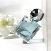 Bouteilles en verre rectangulaires avec couvercles, flacon vide en verre de forme sphérique, atomiseur de parfum, flacon de parfum de luxe 50 ml