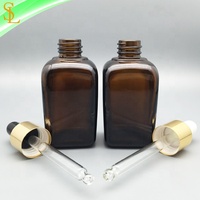 50ml quadratische Braunglas-Tropf flasche für Hautpflege serum mit Gold/Silber-Kappe und Gummi oberteil