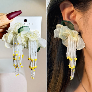 Nouvelles boucles d'oreilles en tissu faites à <span class=keywords><strong>la</strong></span> main <span class=keywords><strong>de</strong></span> style bohème, boucles d'oreilles longues à pompons tendance pour femmes - Product Image 2