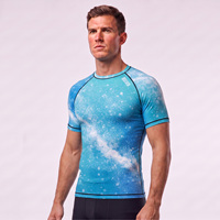 Rashguard Homme Manches Courtes Raglan Doux au Toucher Anti-UV Imprimé Splash Bleu Aqua Voile Surf Haute Respirabilité