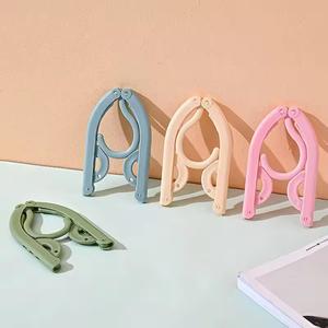 Nouveau 2025 Multifonctionnel Portable Pliant Séchage En Plastique Rack Pliant Vêtements Voyage Magique <span class=keywords><strong>Cintre</strong></span> - Product Image 1