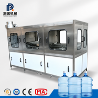Machine de remplissage d'eau automatique industrielle 100 BPH à petite échelle pour barils d'eau de source de 5 gallons