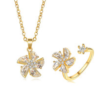 Ensemble collier et bague réglable anti-anxiété relaxant pour femme, avec pendentif moulin à vent rotatif en zircon étincelant incrusté de cuivre