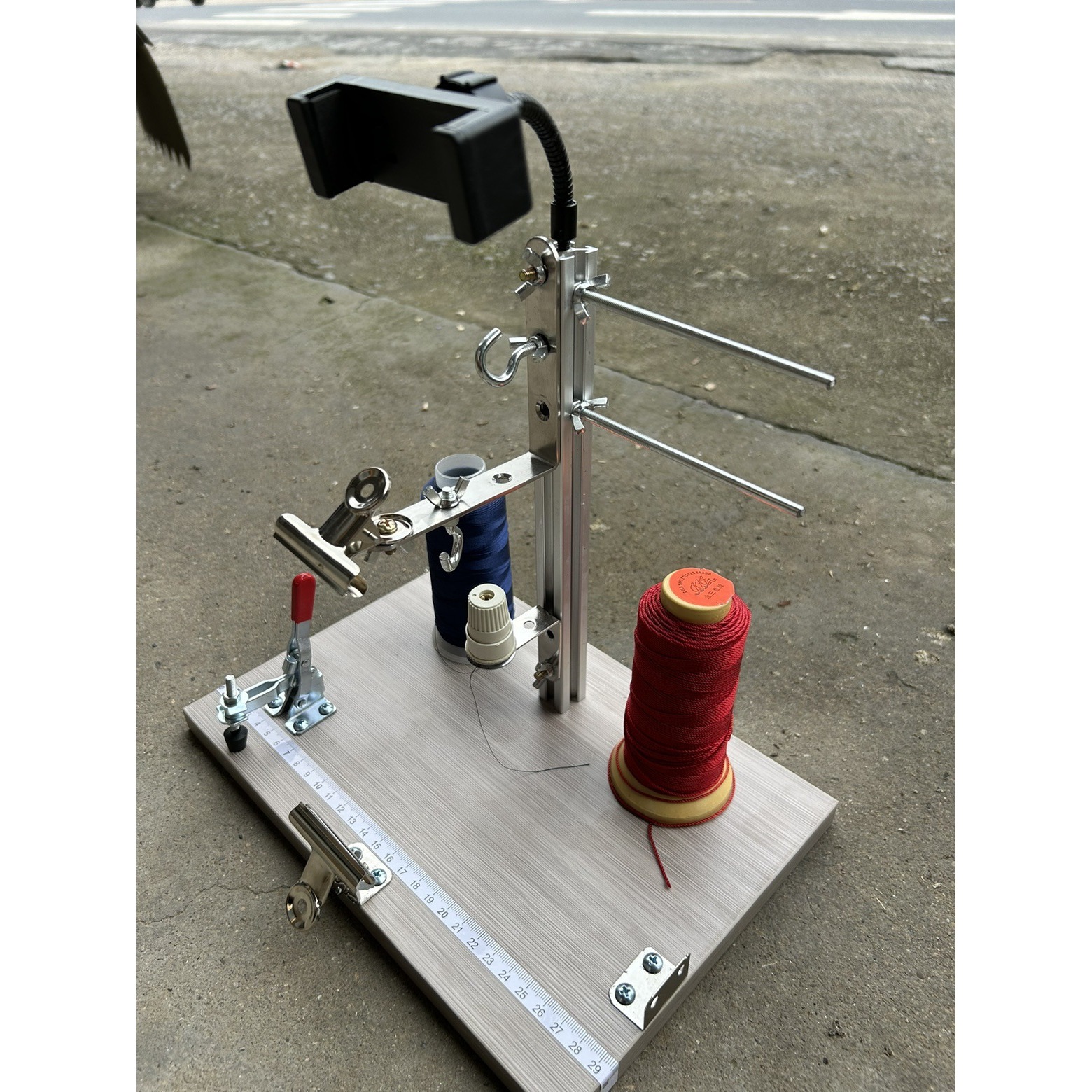 Gray standard with phone holder