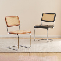 Fauteuil de salon en rotin rétro avec dossier en bois massif simple et moderne