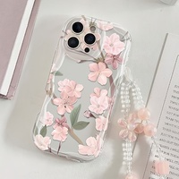 Coque de téléphone portable motif fleurs de cerisier tendance avec chaîne pour iPhone 16 Plus 15 17 18 Pro Max, coque arrière crème