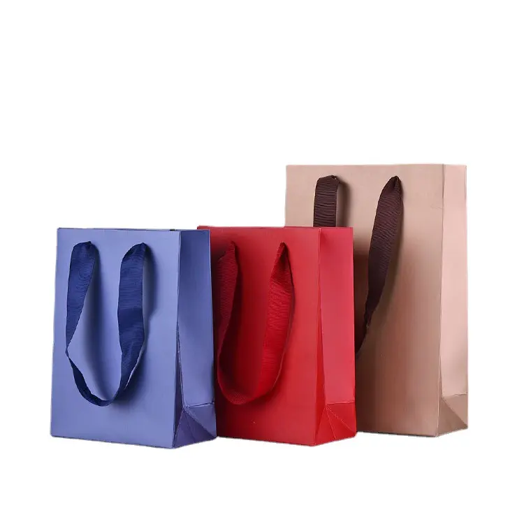 حقيبة ورقية ملونة فاخرة مخصصة حقائب ورقية للهدايا للتسوق في المتجر بالتجزئة تحمل شعارك الخاص