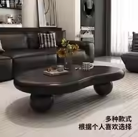 Table basse en pierre en forme de nuage, design de luxe léger d'inspiration française, ton crème, table de forme irrégulière, pour salons modernes.