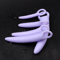 Vente en gros OEM Plug anal vibrant en silicone et ABS avec anneaux de traction et perles, 100% étanche, pour adultes