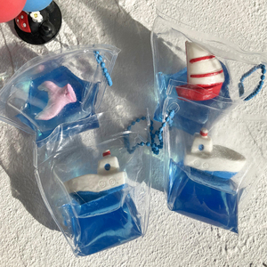 Juguete creativo de descompresión de verano, artefacto musical transparente de plástico con color de sal marina para apretar, para niños de 5 a 7 años, inspirado en el océano. - Product Image 3