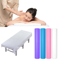 Le salon de beauté utilise des draps de lit et des rouleaux de canapé jetables en papier d'examen médical PP + PE 35 g/m² de 60 * 45 cm.