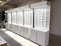 Meuble de présentation de lunettes de soleil et de lunettes optiques avec tiges verrouillables pour magasin d'optique