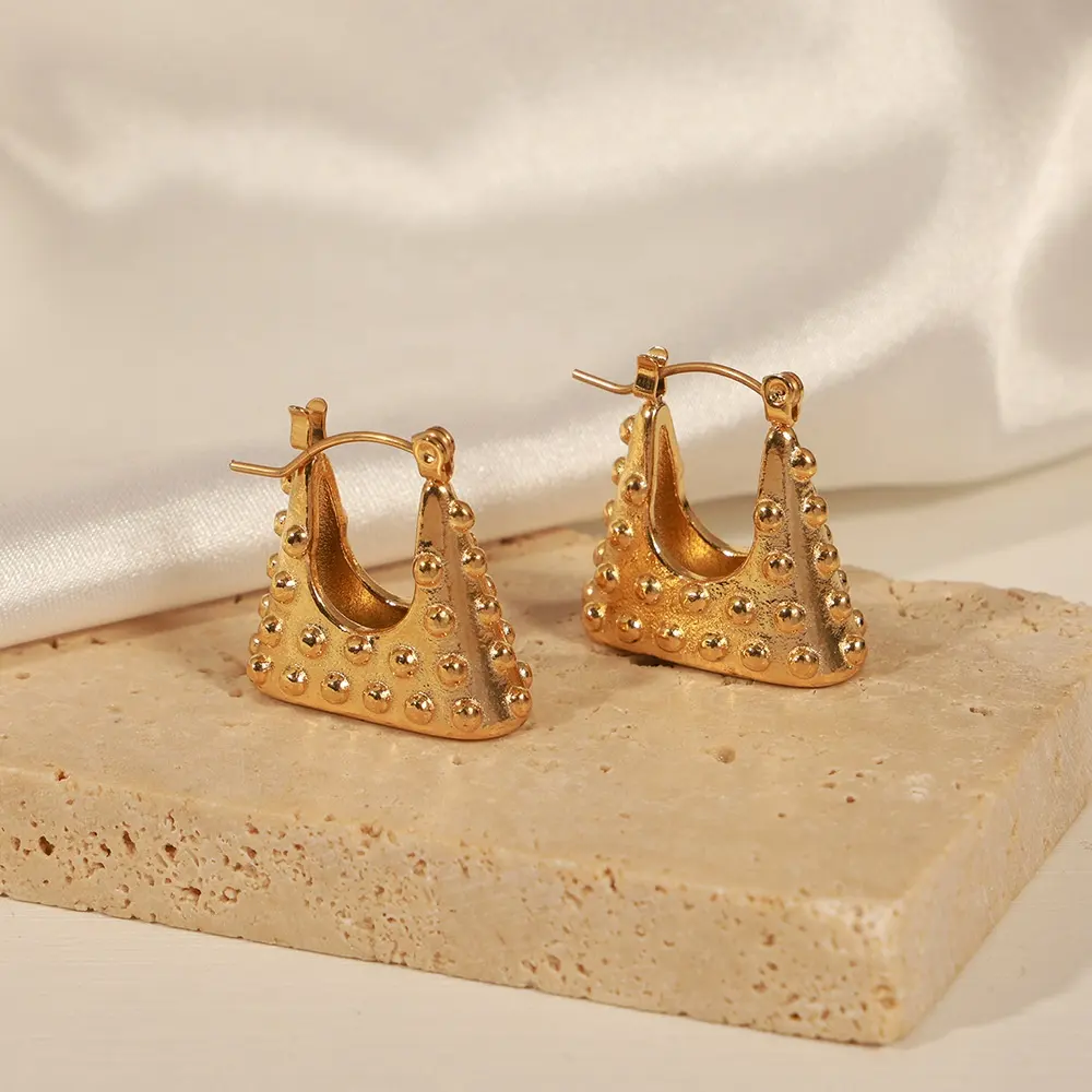 Moda 18K oro placcato in acciaio inox cavo piccola borsa forma Huggie cerchio orecchini gioielli donna