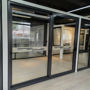 Puerta Corredera de Aluminio de Doble Vía Sin Aislamiento GADE101 Premium para Entrada Interior de Edificios Comerciales - Product Image 1