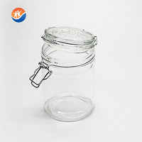 Vente en gros d'ustensiles de cuisine OEM bocal et bouteille en verre personnalisés pour le stockage des aliments bocal à bonbons en verre transparent hermétique avec couvercle en verre siliconé