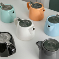 Théière en porcelaine colorée en gros avec couvercle et infuseur en acier inoxydable, design classique pour les fêtes