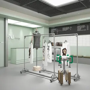 Estantes de exhibición de fijación para tienda de ropa, estantes de fijación de estilo Industrial para tienda de ropa