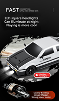 Simulación 2,4g tracción en las cuatro ruedas drift Racing spray niños competitivo control remoto coche de juguete Nissan GTR coche de control remoto