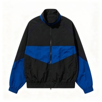 Veste de sport tissée classique pour homme, noire et bleue, avec blocs de couleur, idéale pour l'entraînement en extérieur, le fitness et les activités quotidiennes décontractées