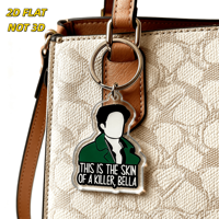 Porte-clés en acrylique Bella Quote « Skin of a Killer » avec silhouette, veste verte et texte gras – Accessoire fantaisie pour clés et sacs