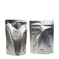 Sachet de café mini refermable de 20g avec impression en gravure, en matériau CPE recyclable, noir, avec fermeture à lien métallique, capacité 100g