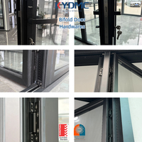 Porte pliante double vitrage en aluminium insonorisée, isolée thermiquement et étanche pour patio et jardin, de la marque American Villa Builder