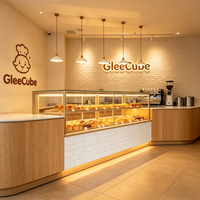 Airy Luxe Bakery & Coffee Market Stall Featuring Glass Display Case, Open Tiered Shelving, and Integrated Warm Lighting