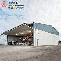 Hangar préfabriqué en acier léger pour hélicoptères, résistant aux tremblements de terre, isolé, résistant à la corrosion, structure en acier à grande ouverture