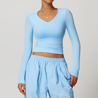 T-shirt de sport à manches longues pour femme, grande taille, séchage rapide, respirant, pour la course à pied, coupe ajustée, motif uni, ensemble de sport pour le yoga