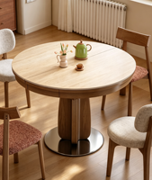Table de salle à manger d'hôtel convertible moderne, plateau en chêne clair, base en piédestal cannelé, design rond en métal chromé, 4-6 places