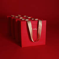 Sac en papier de luxe artisanal haut de gamme avec logo personnalisé, estampage à chaud, poignée en ruban, réutilisable pour les boutiques de créations artisanales
