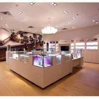 Vitrine de présentation de bijoux de luxe moderne avec éclairage LED pour colliers et boucles d'oreilles, idéale pour les boutiques