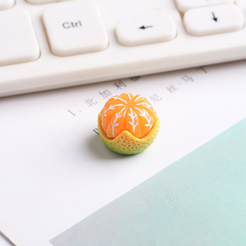 Media piel pequeña naranja verde