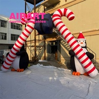 Arches de bonbons gonflables de décoration de Noël, pingouins de Noël gonflables et arc de bonbons pour l'affichage