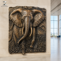 Sculpture murale en bronze d'éléphant, relief artisanal avec patine antique pour la décoration intérieure des hôtels, villas et salons