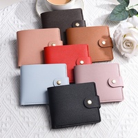 Dompet PVC Portabel Terlaris Lintas Batas Warna Hitam Unisex Model Pendek 2026 Model Baru Desain Kancing Jepret Horizontal Ultra-tipis