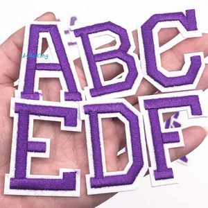 Juego de 26 Apliques del Alfabeto Inglés en Color Morado (A-Z) |   Parches Termoadhesivos con Letras para Ropa, Bolsos y Zapatos - Product Image 1
