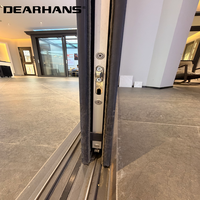 Porte coulissante en verre à cadre en aluminium à rupture de pont thermique, design résistant au vent et aux intempéries pour application extérieure de maison moderne