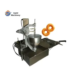 Cuisson de donuts en forme de fleur, fabrication manuelle de donuts, friteuse de donuts, machine à donuts au gaz entièrement automatique