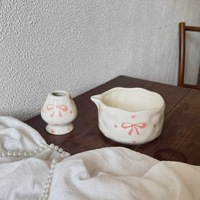 Service à thé Matcha de luxe japonais pastel, design nœud, artisanal en bambou et céramique, écologique, avec fouet harmonieux et support, vaisselle élégante
