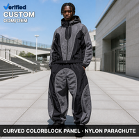 Ensemble assorti pour homme, pantalon parachute noir personnalisé, coupe oversize, colorblock, en polyester, avec fermeture éclair et taille élastique, style futuriste