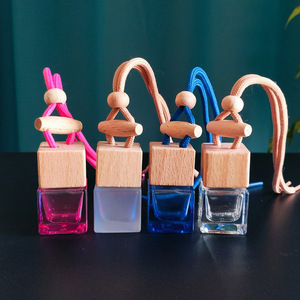 ขวดน้ำหอมแก้วสำหรับแขวนในรถยนต์ ขวดเปล่าสำหรับใส่น้ำหอมหรือน้ำมันหอมระเหย ขนาดพกพาสำหรับเดินทาง ใช้แขวนกระจกมองหลัง ตกแต่งภายในรถยนต์ - Product Image 1