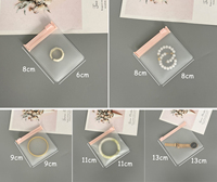 Emballage d'accessoires de bijoux en plastique souple, vente en gros, matériau PE, sac de rangement pour bijoux transparent imperméable avec fermeture éclair pour bracelets