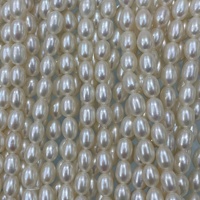 Vente en gros d'usine de perles d'eau douce naturelles en forme de riz, perles en vrac de 6-7 mm et perles d'eau douce ovales pour la création de bijoux DIY