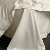 Parure de lit de luxe légère en coton longues fibres 100S, quatre pièces, couleur unie, type drap, satin, brocart jacquard haute précision