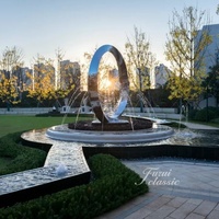 Fontaine d'eau sculpturale en acier inoxydable poli miroir, soudée sur mesure, grand cercle, art métallique pour jardin extérieur