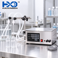 Machine de remplissage semi-automatique à double tête pour liquides, eau, boissons, jus, emballage de bouteilles en plastique et petite ligne de production