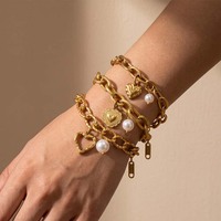 Bracelet chaîne épaisse en acier inoxydable plaqué or 18 carats avec pendentif cœur creux et perles acryliques pour femme